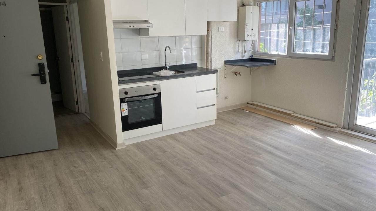 Cocina integrada al estar tras la remodelación, Diagonal Paraguay